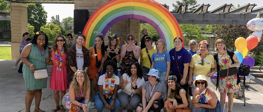 people standing together during Out at the beach, Pride event